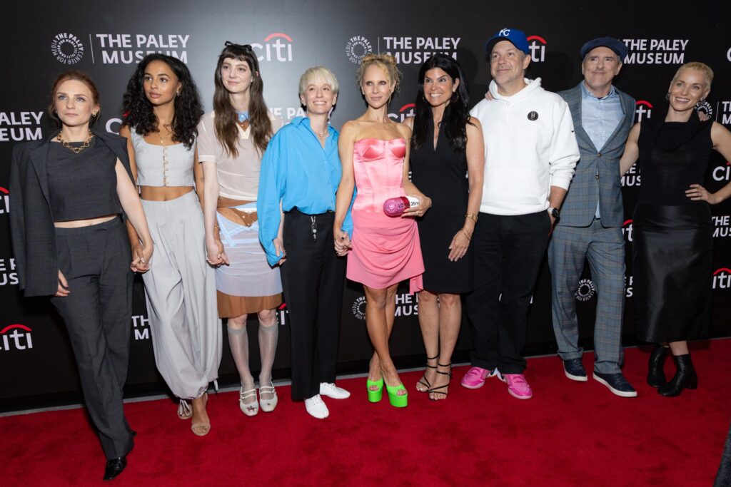 Ted Lasso cast poses together on the red carpet at The Paley Museum event